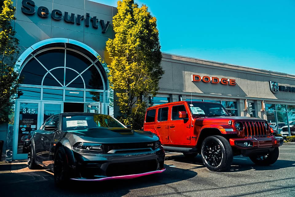 Security Dodge Chrysler Jeep RAM showroom exterior with Jeep vehicles in Amityville, NY